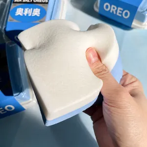 Close-up of soft slow-rebound squishy toy being squeezed for stress relief