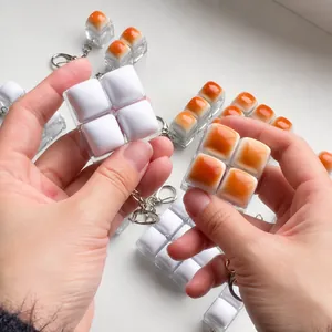Simulatie brood fidget speelgoed sleutelhanger met tactiele knoppen voor stressverlichting