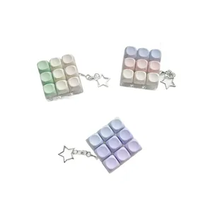 Macaron 9-key mechanical switch tester stress relief keychain toy in pastel colors