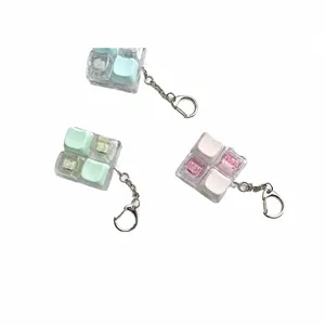 Mechanical switch tester fidget keychain with transparent cat ear keycaps for stress relief