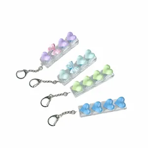 Ice transparent heart-shaped keyboard fidget button keychain set for stress relief