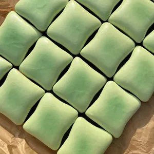 Macro view of pale green slow rebound jasmine chiffon toast PU foam squishy toys