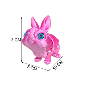 Detailed view of pink articulated 3D printed rabbit with 8x5x10cm dimensions