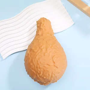 Close-up detail of a realistic fried chicken leg slow rebound squishy toy for stress relief