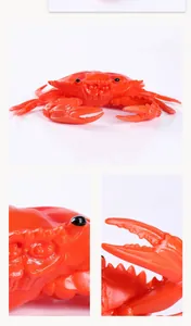 Detailed close-up views of a realistic red simulation crab toy showing texture and claws