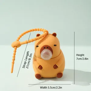 Primer plano de un juguete antiestrés Capybara con 7 cm de altura y correa
