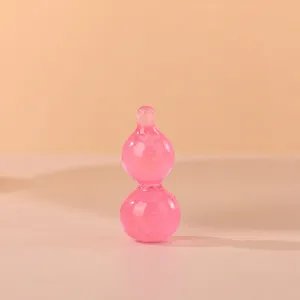 Detalle del juguete antiestrés de calabaza luminosa rosa translúcido