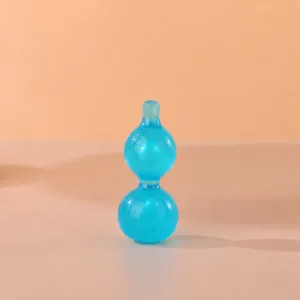 Detalle del juguete antiestrés con forma de calabaza luminosa azul translúcida creativa