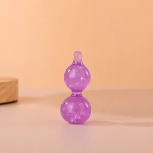 Juguete antiestrés con forma de calabaza luminosa translúcida morada para juego sensorial.