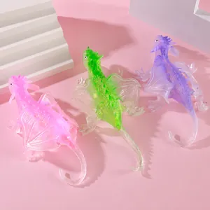Close-up of translucent colorful flying dragon squeeze toys for stress relief