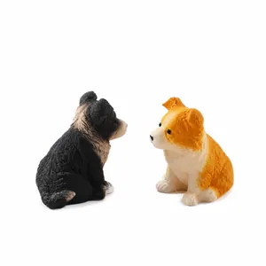 Pair of cute Border Collie squishy stress relief toys in black, white, and yellow