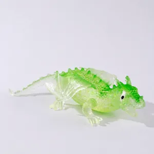 Macro view of green translucent dragon squishy toy for stress relief