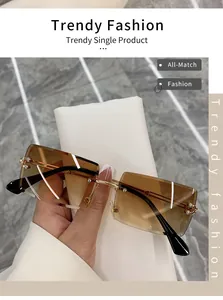 Detailed close-up of N825 rimless rectangular sunglasses featuring gradient brown lenses.