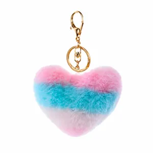 Porte-clés cœur en peluche fait main avec rayures en fausse fourrure rose et bleu