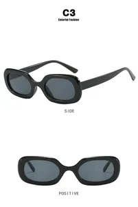 Front and side view of retro black oval sunglasses with dark lenses and a minimalist frame