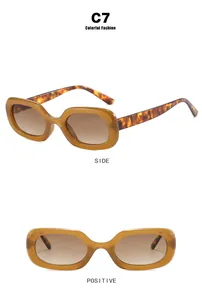 Vintage oval sunglasses in amber with tortoiseshell temples, shown from side and front views.
