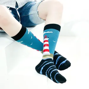 Vibrant unisex crew socks featuring a lighthouse and ocean wave pattern design.