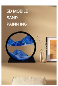 3D circular mobile sand painting with blue sand in a black frame for desktop decor