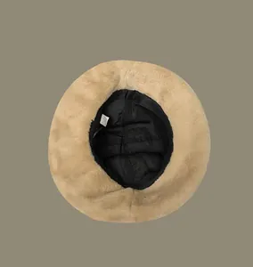 Interior detail of a fluffy plush bucket hat with soft lining for winter warmth