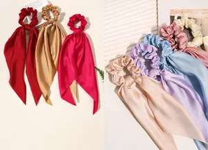 Elegant satin ribbon scrunchies for ponytail styling in assorted solid colors for women