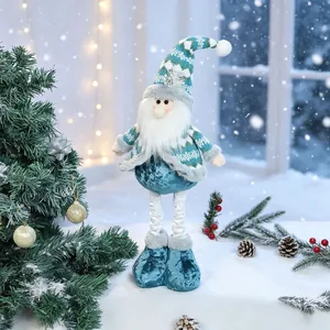 Decorative teal blue telescopic Christmas gnome Santa doll on winter snow background