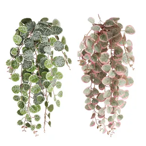 Two styles of artificial hanging plants with heart shaped leaves for home decor