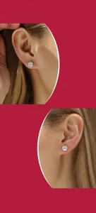 Detailaufnahme eines 1-Karat-Moissanit-Ohrsteckers am Ohr mit silbernem Schraubverschluss.