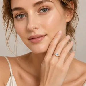 Elegant 2-carat moissanite ring with four-prong micro-pave setting shown on model finger