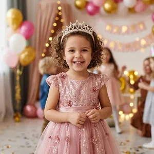 Detailed view of a sparkling rhinestone princess crown headband for a girl's birthday party