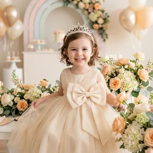 Detail shot of a sparkling rhinestone tiara headband worn by a toddler girl at a party.