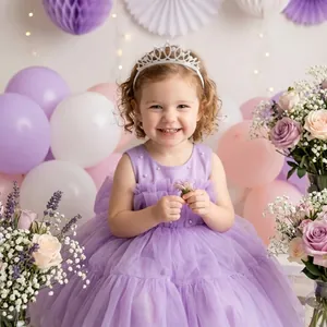 Close-up of a girl wearing a shiny rhinestone crown headband for birthday parties
