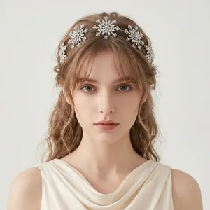 Elegant bridal snowflake rhinestone headband hair accessory for wedding and party wear.