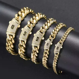 Close-up detail of gold stainless steel cuban link chains in widths from 6mm to 14mm