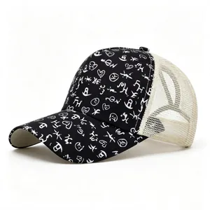 Detail of black baseball cap with white graffiti print and beige mesh ponytail hole