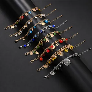 Detailed view of assorted stainless steel bead bracelets with evil eye and star charms