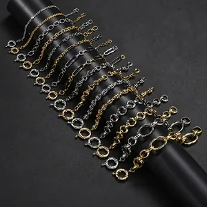 Macro view of various textured stainless steel chain bracelets in gold and silver