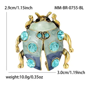 Kever speld met blauw emaille en strass steentjes, maat 2,9 cm en gewicht details