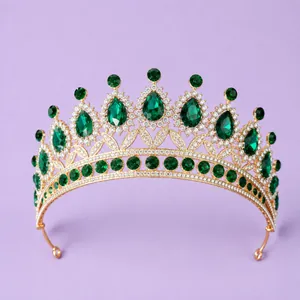 Elegant vintage gold bridal tiara with emerald green rhinestones for weddings and parties