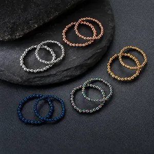 Close-up detail of multi-colored beaded elastic rings crafted from durable titanium steel.