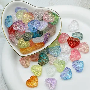 Macro detail of colorful faceted heart-shaped glass beads for DIY handmade jewelry crafting