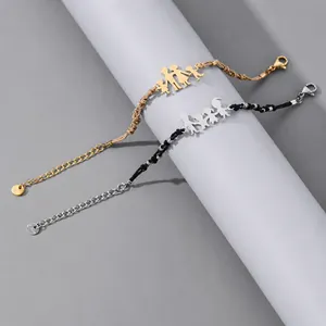 Detailed close-up of stainless steel family pendant bracelet with adjustable rope design