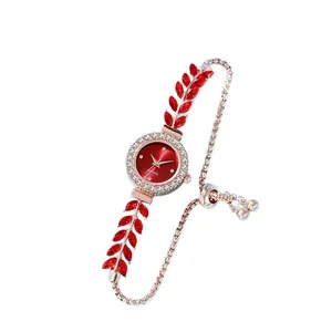 Elegant women's leaf-shaped red rhinestone bracelet watch with adjustable pull-bead chain