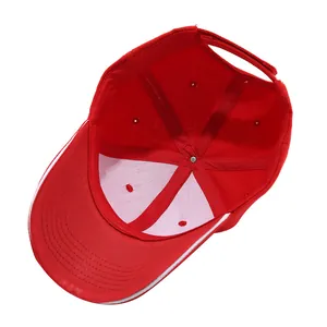 Detailed view of the internal structure of a red baseball cap with adjustable strap.