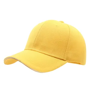 Solid yellow baseball cap with curved brim and visible twill fabric texture detail