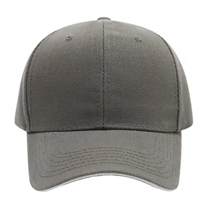 Detailed front view of a plain dark grey baseball cap with premium fabric texture