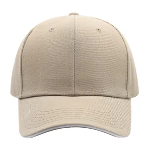 Front view detail of a classic beige baseball cap with visible twill fabric texture