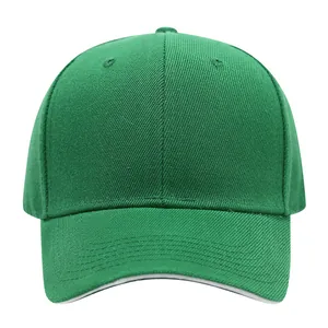 Close-up front view of a plain green cotton baseball cap for custom logo embroidery