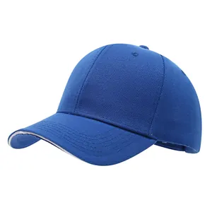 Detailed side view of a plain royal blue baseball cap with white brim detail