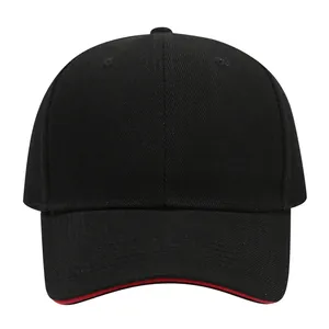 Detailed front view of a classic plain black baseball cap featuring a subtle red brim trim