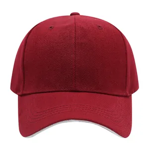 Close-up front view of a classic burgundy baseball cap with a subtle white brim accent